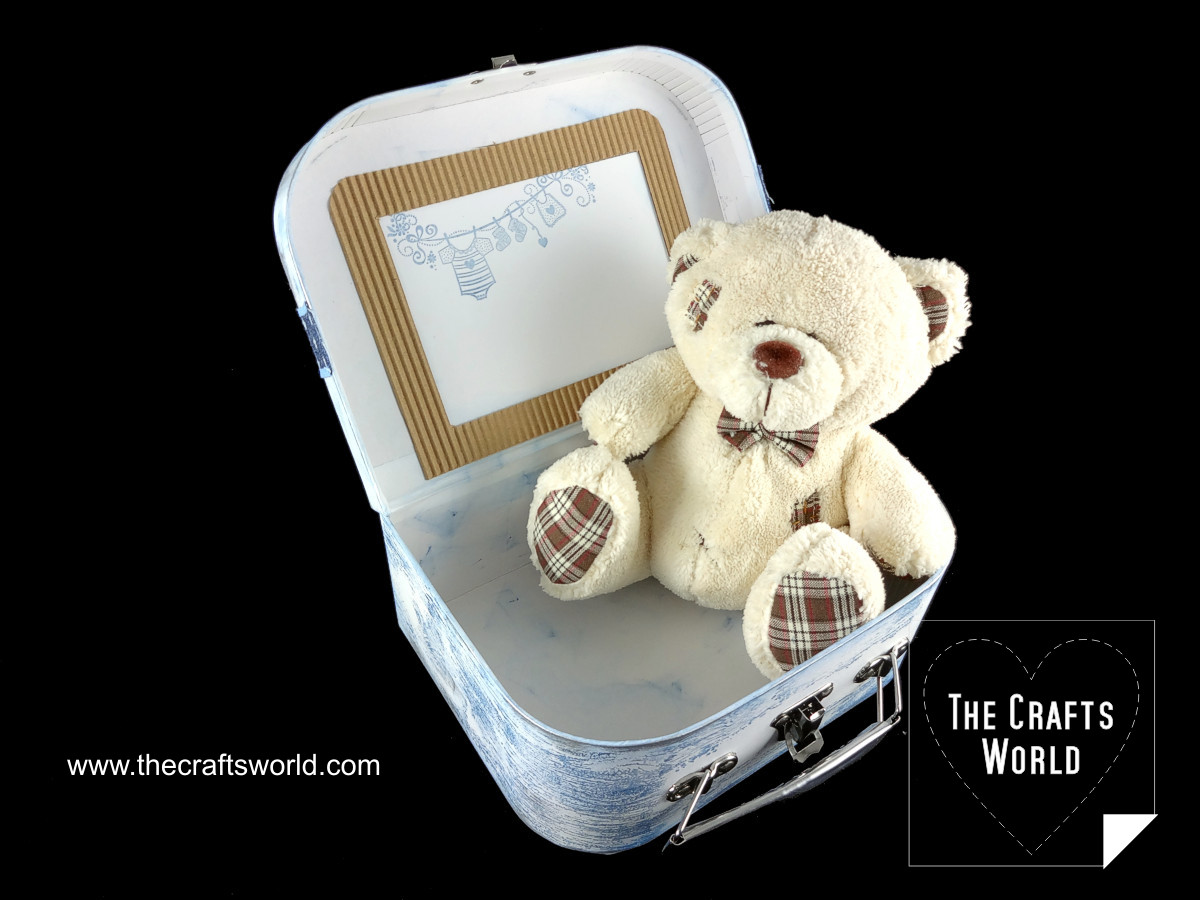 Baby storage box with a teddy bear Open